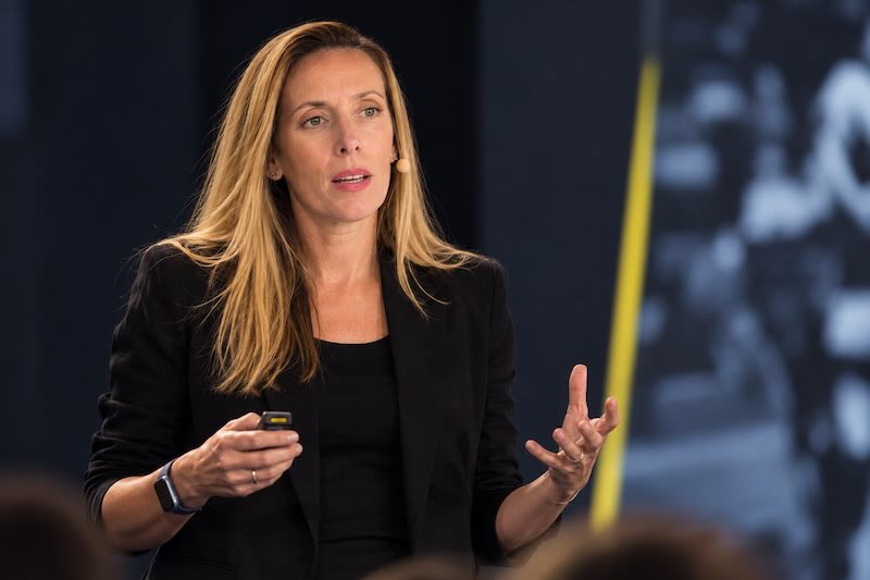 Kate Oram speaking on stage